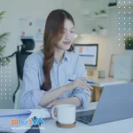 email virtual assistant working on laptop