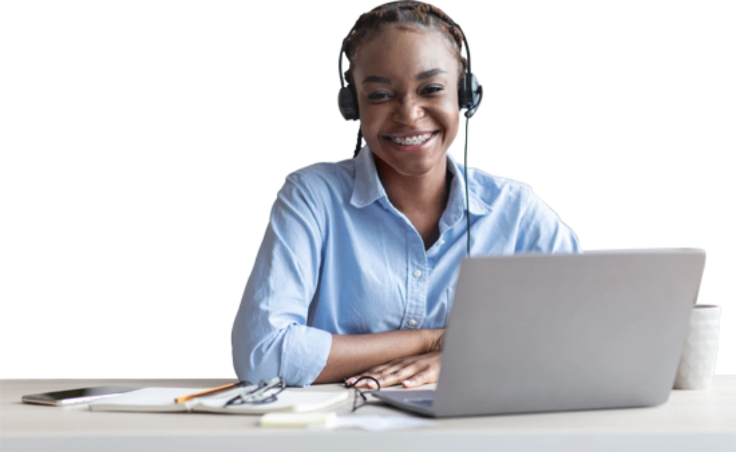 Person with headphones on smiling at the camera
